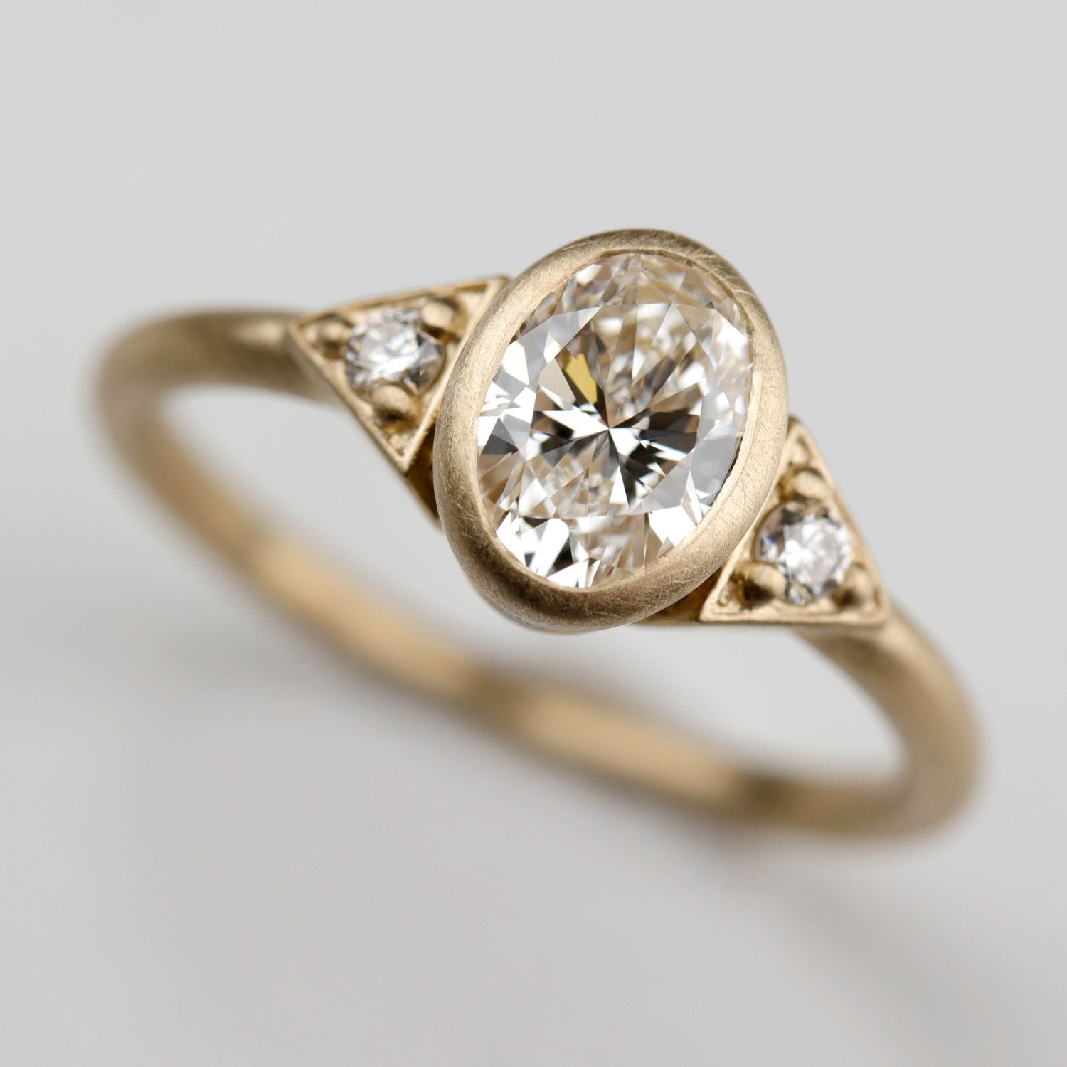 7x5mm Oval Deco Three Stone Ring