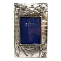 Pewter picture frame with golfers in different poses on each corner of the frame and the words "hole in one" engraved around the inside of the frame pf67