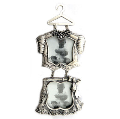 Double picture frame that hangs resembling a girls shirt and skirt on a hanger pf69